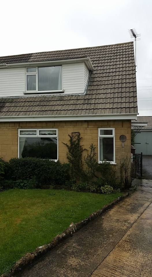 A house in Bath that has had the roof cleaned by Barnes Property Services.